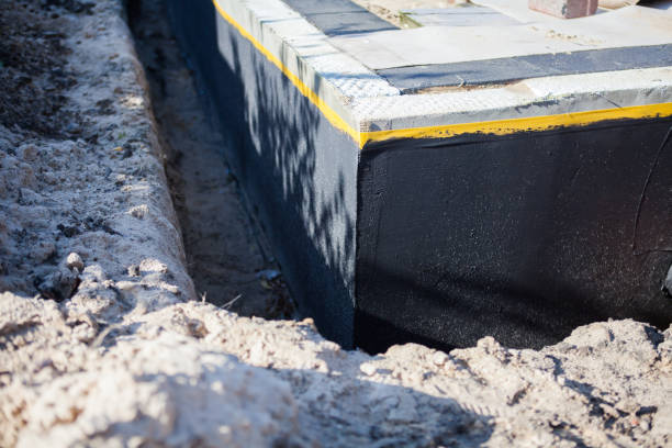 Professional Waterproofing technician working in Maple Rapids, MI